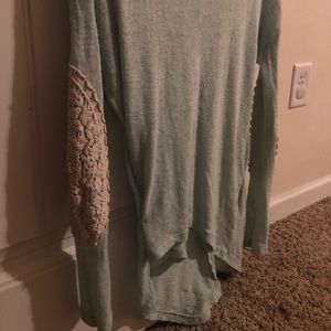 Very cute long sleeve top with laced elbows